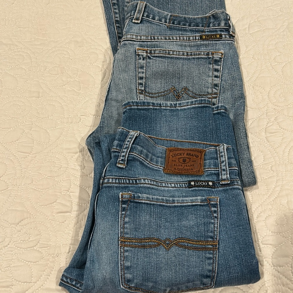 TWO pairs of Lucky Jeans